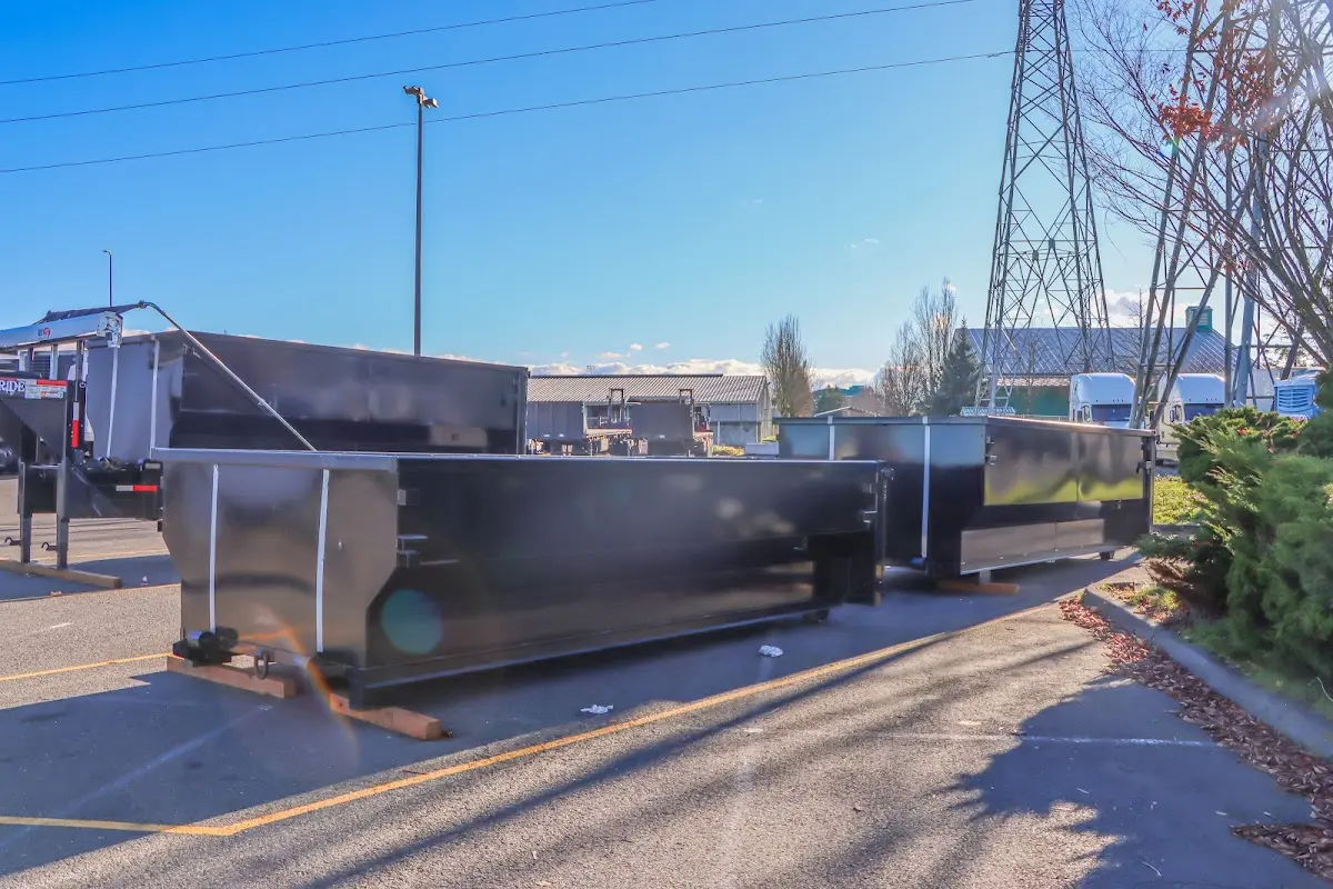 Roll-off dumpster ready for waste disposal at job site for 3 Yard Dumpster Rental in East Greenwich